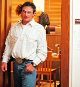Jason Meduna, owner of 3-Strikes Mustang Ranch, walks out of a Morrill County courtroom Wednesday. Meduna waived a preliminary hearing on 149 counts of animal abuse. Meduna has been accused of starving and neglecting horses and burros on the ranch.