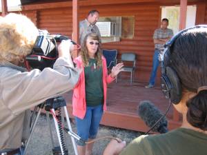 Sue Cattoor speaking at Pryor Mt. 2009 Roundup while Ginger Kathrens films - Photo by R.T. Fitch