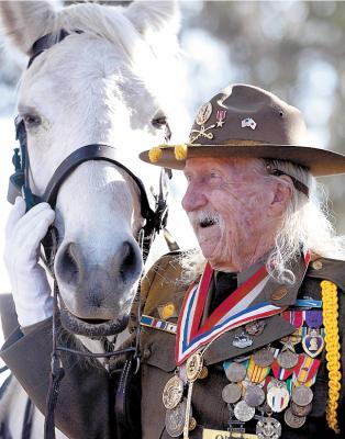 Cavalryman Sgt. Allan MacDonald and his horse, Comanche II. (DAVID ROYAL/The Herald)