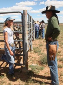 Photo by Sam Minkler Navajo activist Leland Grass (right) confronts horse buyer Jeanne Collom